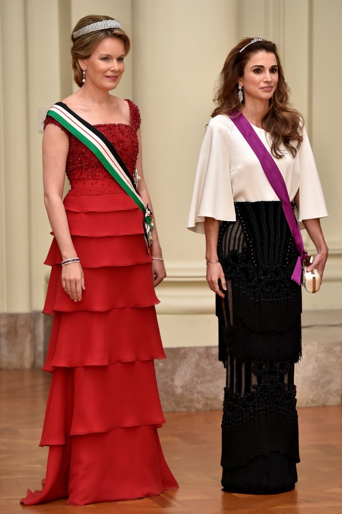 Belgium's Queen Mathilde and Jordan's Queen Rania take part in a gala dinner at the Royal Castle of Laken in Brussels